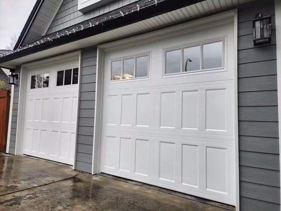 Finished white sectional garage door installation